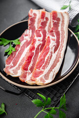 bacon slices fresh meat product pork eating cooking appetizer meal food snack on the table copy space