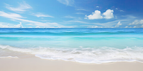 a white sandy beach by a clear ocean