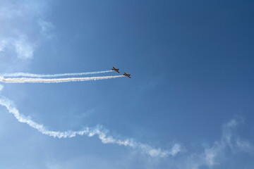 Aircrafts performing aerobatics at airshow