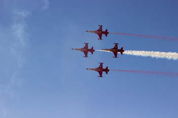 Aircrafts performing aerobatics at airshow
