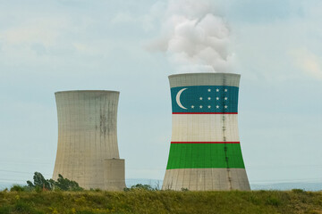 The flag of Uzbekistan is depicted on the cooling tower of the nuclear power plant
