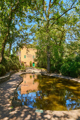 Fototapeta premium Beautiful small castle in the famous park garden sigurta, ( parco giardino sigurta ) near the village of valeggio on the mincio. Italy.