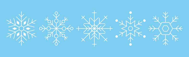 Set of white snowflakes on blue. New Year theme. Vector