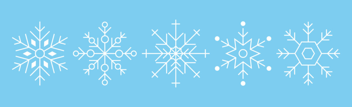Set of white snowflakes on blue. New Year theme. Vector