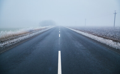 Fototapeta premium Winter Morning on a Lonely Road