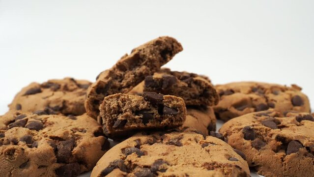 Oatmeal chocolate chip cookies rotate on a white background. Classic oatmeal cookies with chocolate.
