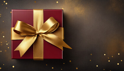 Dark red gift box with gold satin ribbon
