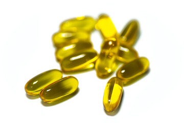 cod liver oil capsules isolated on white bacground