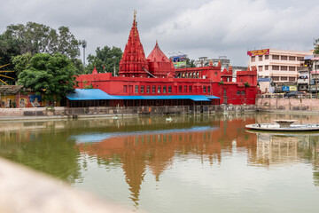 Red Durga Mandir temple near the Ganges river in Varanasi in India.