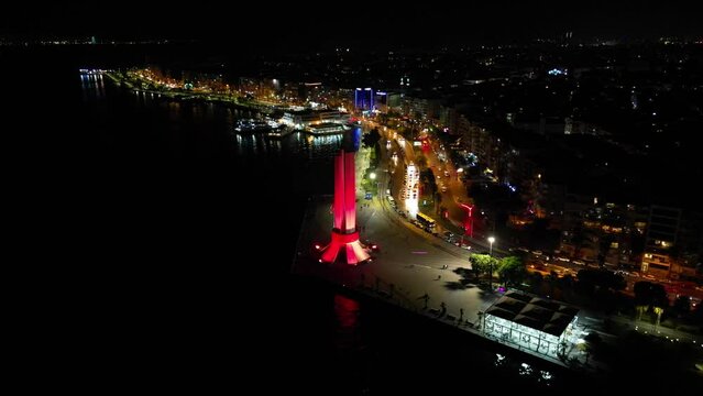 izmir karsiyaka district, sea and ferries and traffic n aerial view with drone on a sunny day. High quality 4k footage