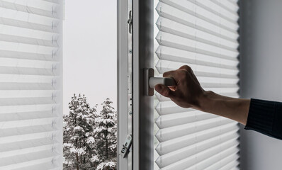 Window in a private house with blinds