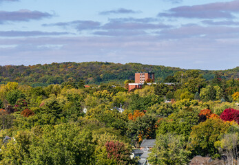 Fototapeta na wymiar Buildings of the liberal arts university of Luther College in Decorah, Iowa among fall colors