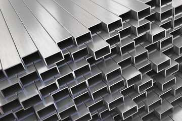 Aluminium or steel profiles. Stack of aluminium or steel profiles in warehouse