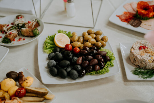 a plate with sliced olives