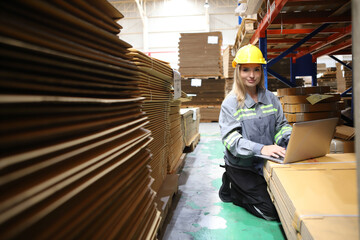 Fototapeta premium worker or engineer working in factory with safety uniform , safety hat and safety glasses , image is safety concept or happy workplace