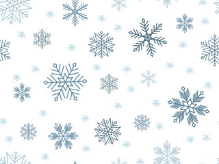 Blue Snowflakes of different sizes on white background. Seamless Pattern. Winter snowfall ornament. Falling snow