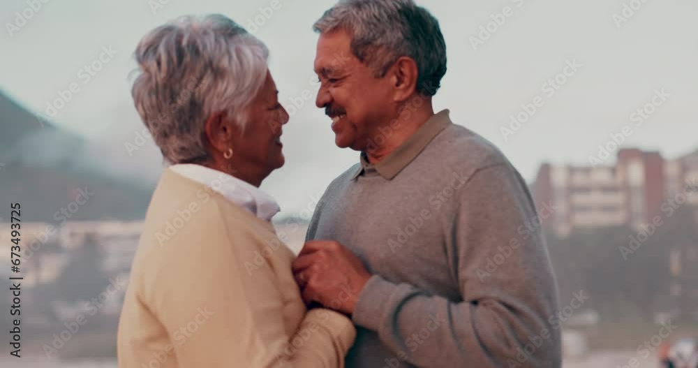 Canvas Prints Love, freedom and senior couple dance at the beach, happy and bond in nature for travel, freedom and vacation. Dancing, smile and old people hug, holding hands and enjoy retirement holiday in Mexico