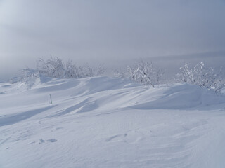 Snowdrifts on the top of the mountain.