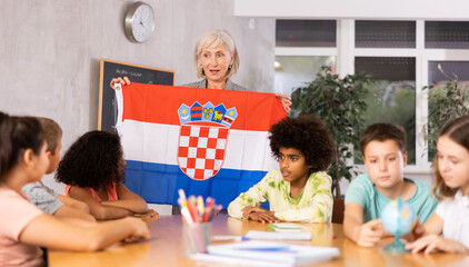 Kids learning together about croatia in geography class