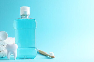 A mouthwash on a colored background. Dental care, dental health.