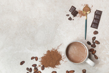 Cocoa in different presentations, hot drink, beans, powder and chocolate bar