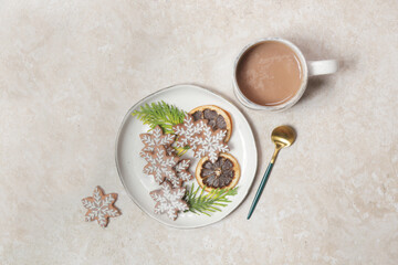 Christmas gingerbread cookies and chocolate milk mug, concept of winter holidays desserts and decoration