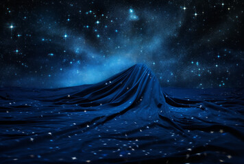 Aesthetic, elegant dark blue tulle fabric with sequins on black background. Starry night composition.