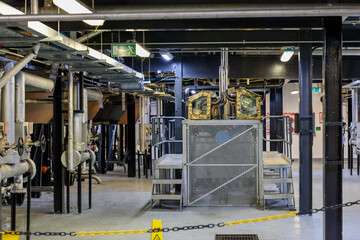 Dufftown Region, Scotland - September 23, 2023:Exterior buildings and warehouses at the Tomatin Whiskey Distillery in the region around Dufftown in Scotland
