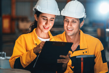 Professional quality control inspector conduct safety inspection on steel machinery and...