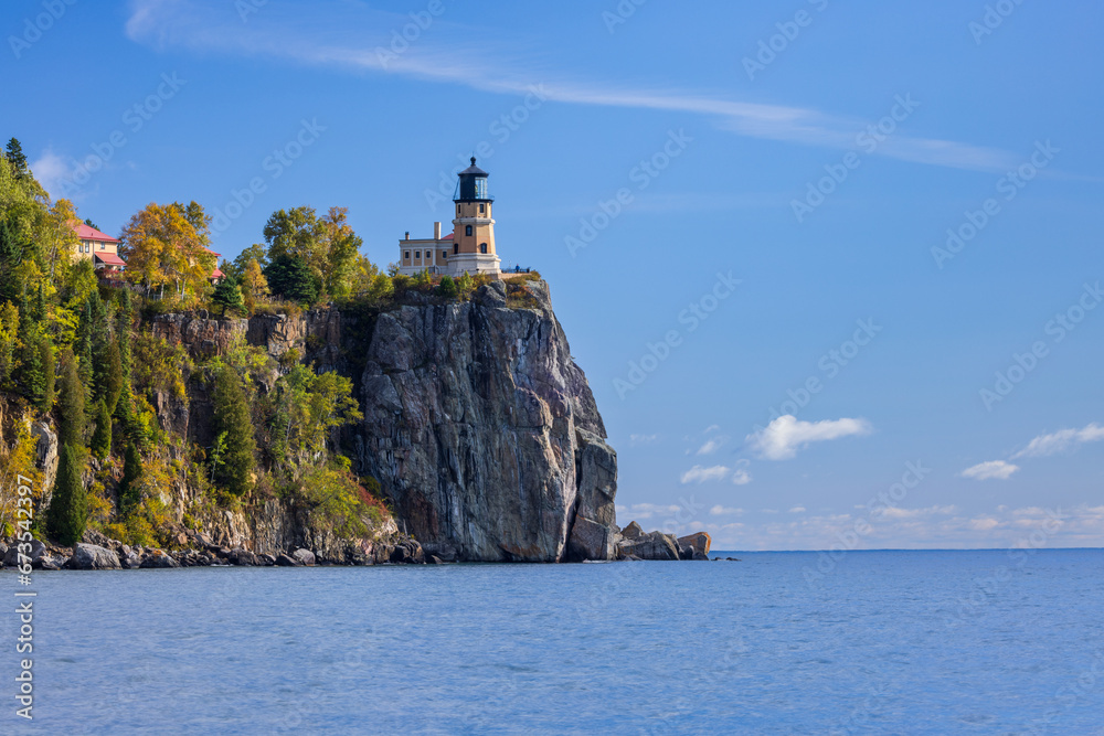 Poster split rock lighthouse - a lighthouse on a cliff along lake superior in autumn.