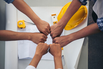Group of multiracial people Teamwork meeting join hands Engineer Manager Foreman fist bump...