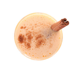 Glass of delicious eggnog with cinnamon isolated on white, top view