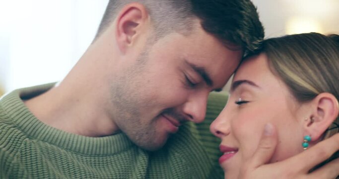 Couple, forehead touch and hug with trust and love, man and woman with intimacy and bonding, romance at home. Happy relationship, people relax in lounge with safety and support, commitment and care