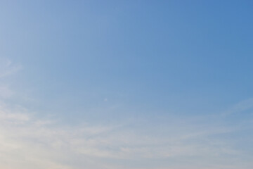 beautiful blue sky and cloud with golden ray sunrise in the morning, natural background