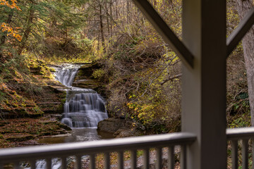 Afternoon fall, autumn photo of a waterfall in Robert H. Treman State Park near Ithaca NY, Tompkins County New York.	