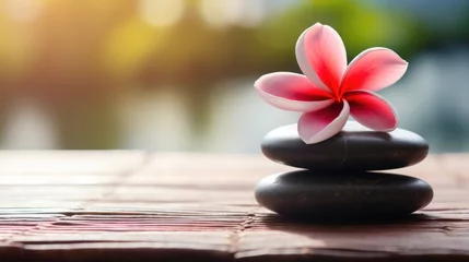 Wandaufkleber zen stones with deep red plumeria flower on blurred background.copy space © CStock