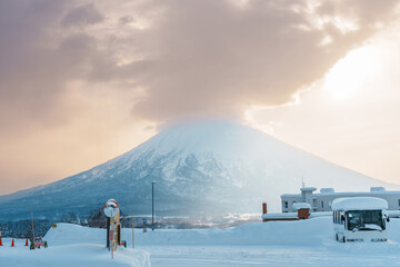 Beautiful Yotei Mountain with Snow in winter season at Niseko. landmark and popular for Ski and Snowboarding tourists attractions in Hokkaido, Japan. Travel and Vacation concept - obrazy, fototapety, plakaty
