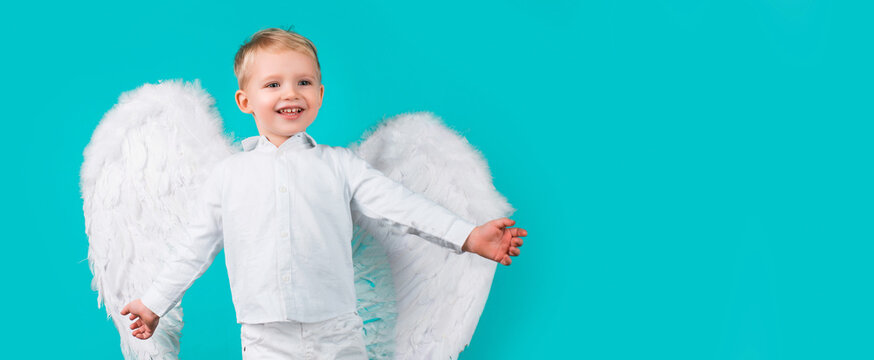 Valentines day banner with angel child. Kids with angel wings. Little cute boy child in angel dress with happy smiling face. Cupid valentin on valentines day. Festive greeting love Card.