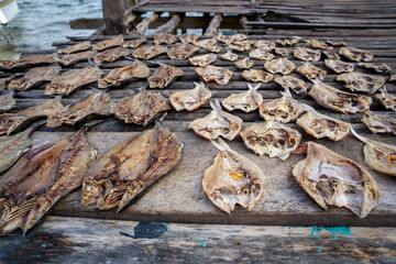 Dried Fish on Wooden Planks