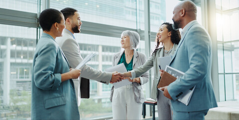 Business people, handshake and meeting in b2b, deal or agreement for teamwork or growth at office. Businessman shaking hands with woman in recruiting for team introduction, greeting or partnership - Powered by Adobe