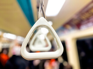 Handles for standing passenger inside a train