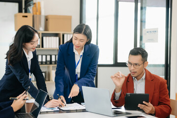Young business creative team are brainstorming planning discussing while sitting in office