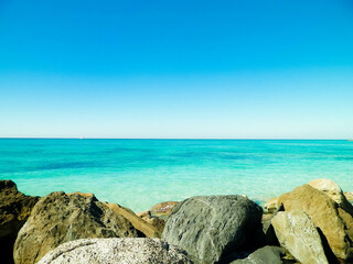 Stones on beach in Vada, Italy.