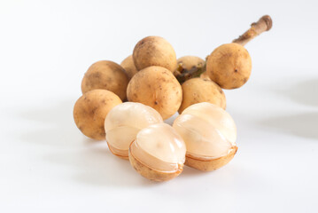 Long gong fruit or lansium parasiticum isolated on white background. Lansium domesticum raw fresh...