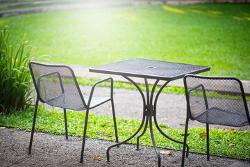 table and chairs in a garden