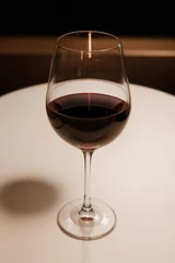 Fotobehang glass of red wine © Nuttawoot