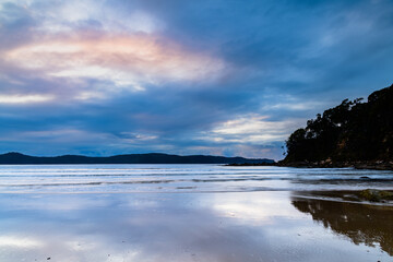 Rainy day sunrise at the beach