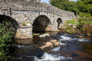 Fototapeta na wymiar Postbridge Dartmoor road bridge