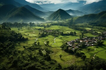 Aerial perspective of a remote village in a lush, green valley