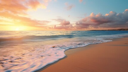 Naklejka na ściany i meble a beach with waves and a sunset